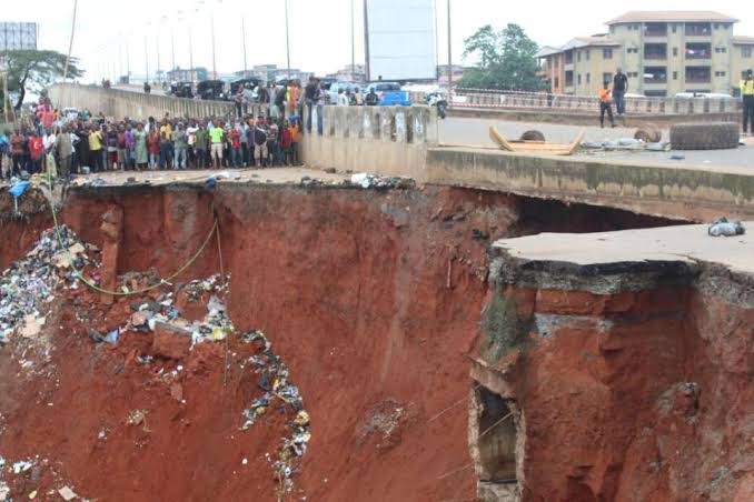 Relief workers assessing drainage canal in Akenfa-Epie