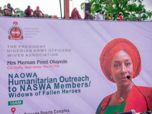 1,500 Military Wives and Widows Get Relief in NAOWA Outreach Group photo of NASWA and MIOWA members