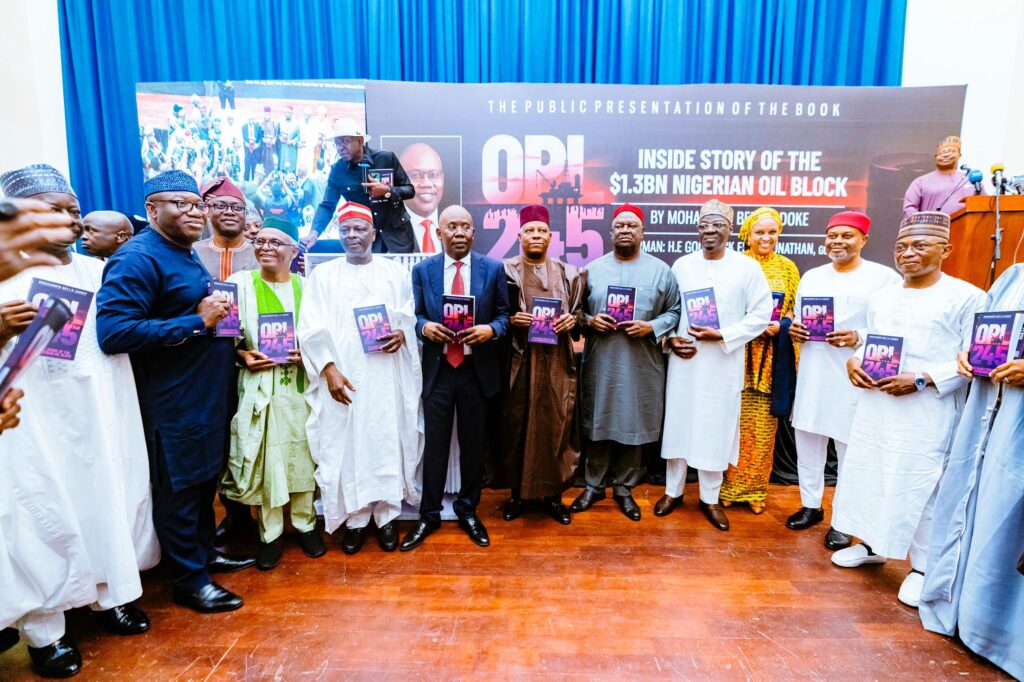 Mohammed Adoke presenting his memoir on OPL 245